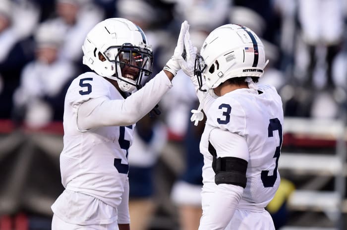 COLLEGE PARK, MARYLAND - NOVEMBER 06: Jahan Dotson #5 of the Penn State Nittany Lions celebrates with Parker Washington #3 after scoring a touchdown in the third quarter against the Maryland Terrapins at Capital One Field at Maryland Stadium on November 06, 2021 in College Park, Maryland. (Photo by Greg Fiume/Getty Images)